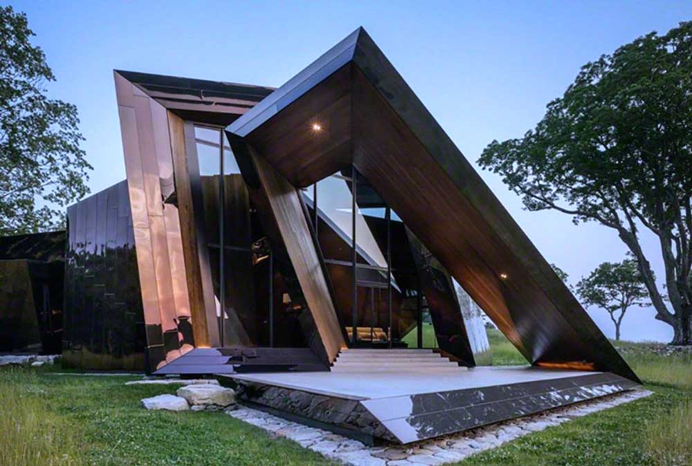 Reflective Stainless Steel Finish of 18.36.54 House to Reflect Climate Changes (Arch2O 2025)