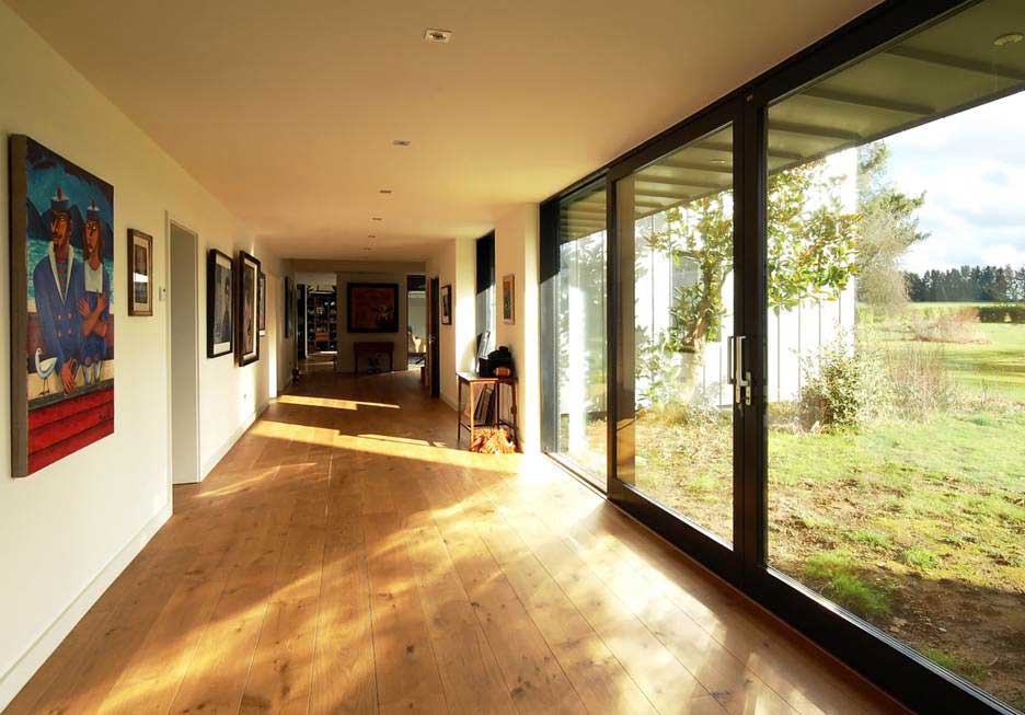 Redesigning the Interior Space of the Wrap House to Capitalize on Garden Views (Image Courtesy Archinect Firms)