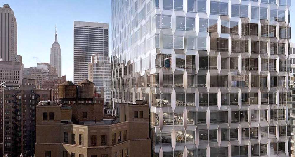 The Façade of International Gem Tower Clad with Glass and Hexagonal Stainless Steel Panels (Photo Courtesy of SOM & ISSF 2025)