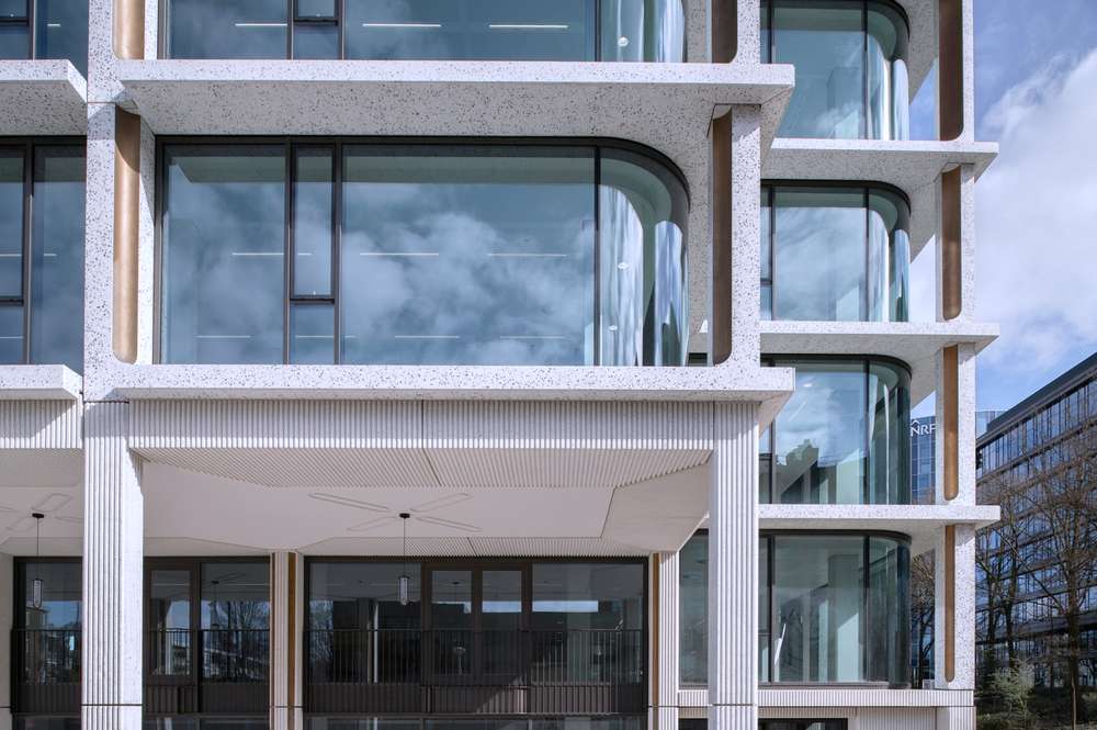 The Stone and Glass Façade of Philips Global Headquarters in Detail (Photo Courtesy of V8 Architects)